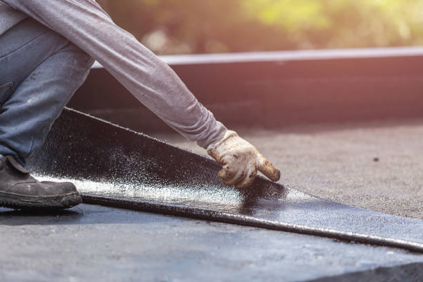 Professional Waterproofing technician working in Quincy, OH